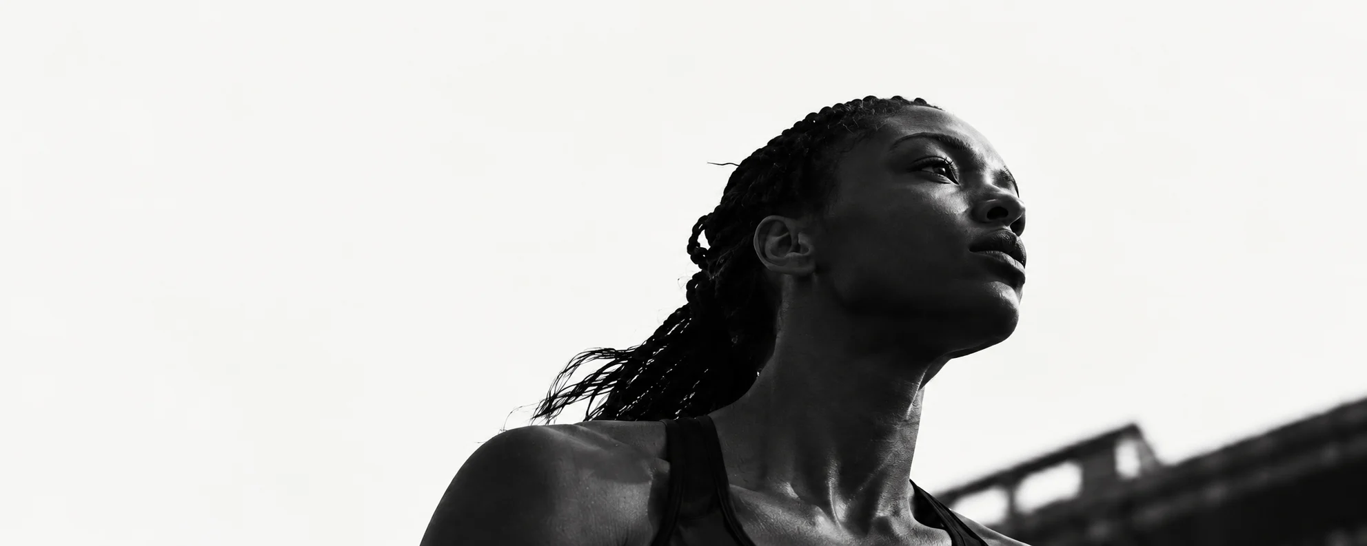 An athlete looking upward, mid-effort